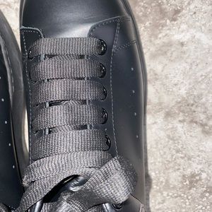 Alexander McQueen. Black w/purple leather.